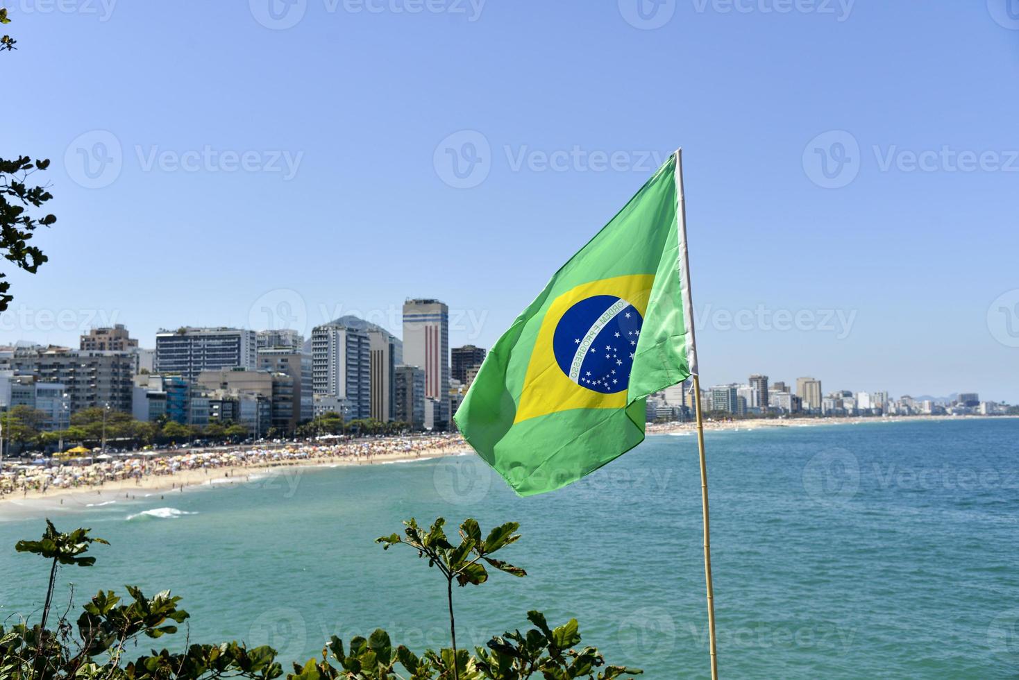 Brazilian Flag on coast photo