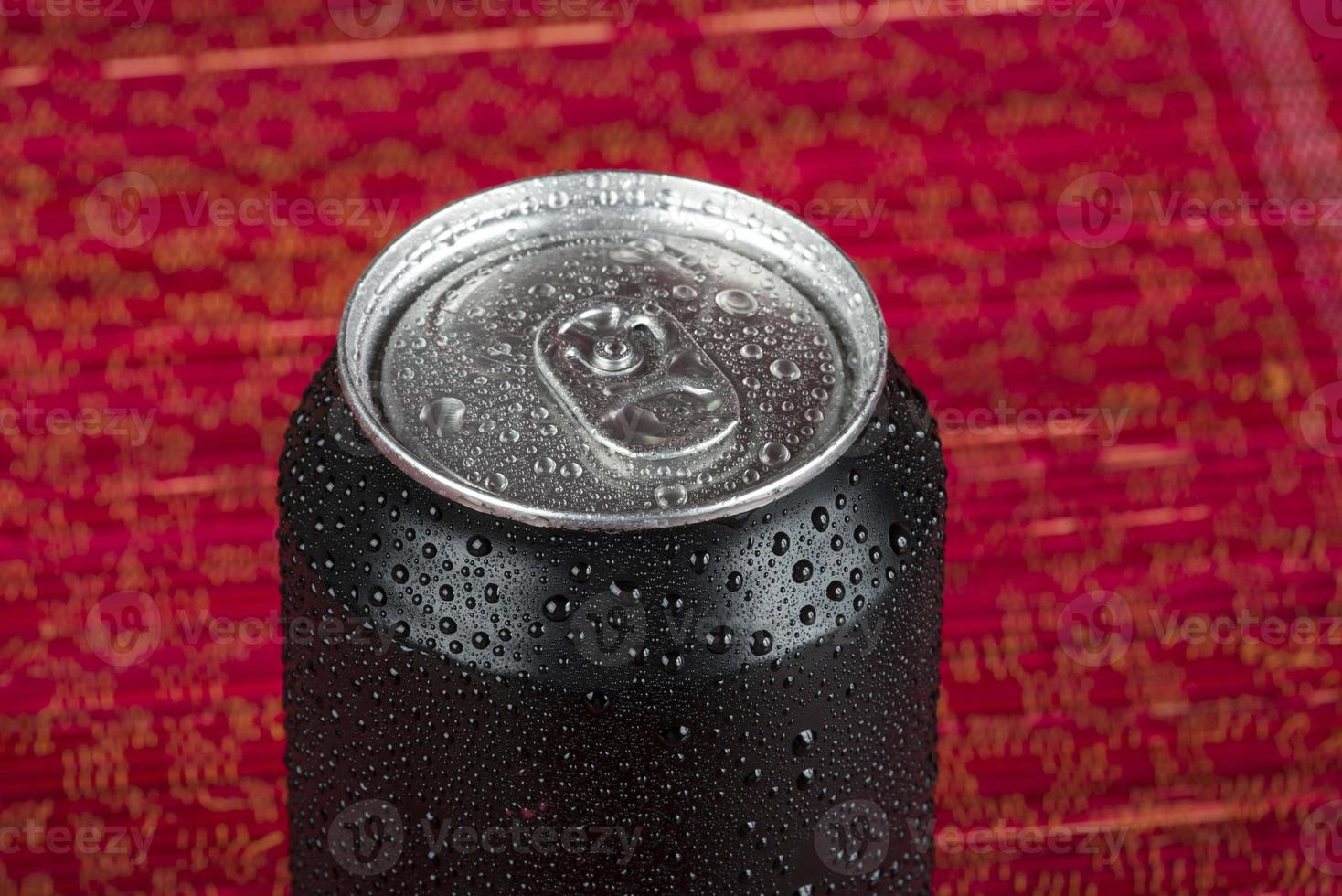 black aluminum can, with drops of water photo