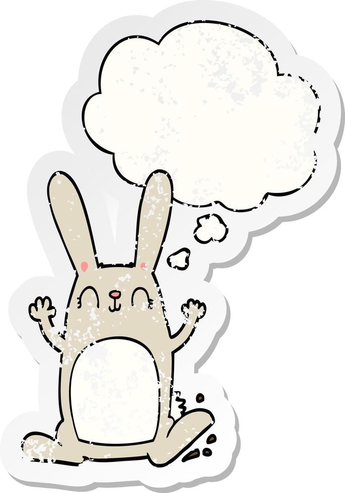 cartoon rabbit and thought bubble as a distressed worn sticker vector