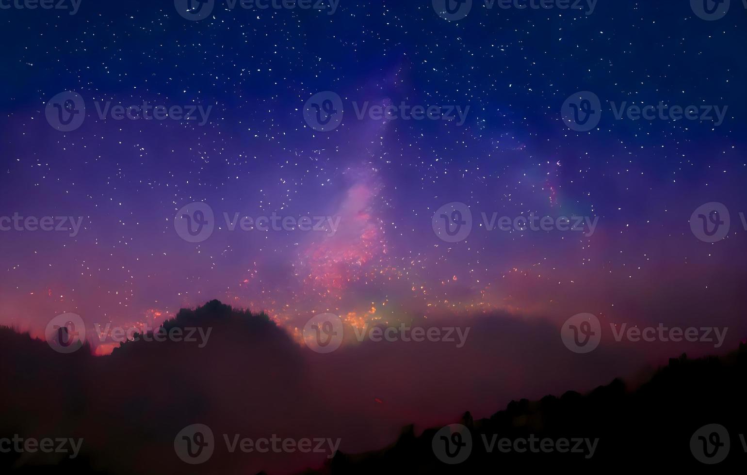 Milky Way and pink light at mountains. Night colorful landscape. Starry sky with hills at summer. Beautiful Universe. Space background with galaxy. Travel background photo