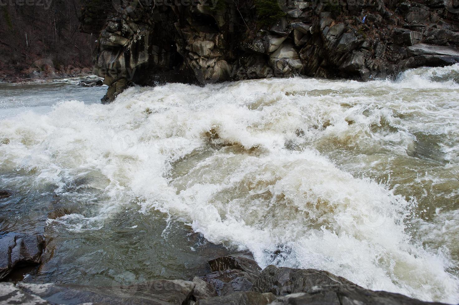 Incredible and stormy Prut river at Carpathian mountains, Jaremcze resort, Ukraine, Europe. photo