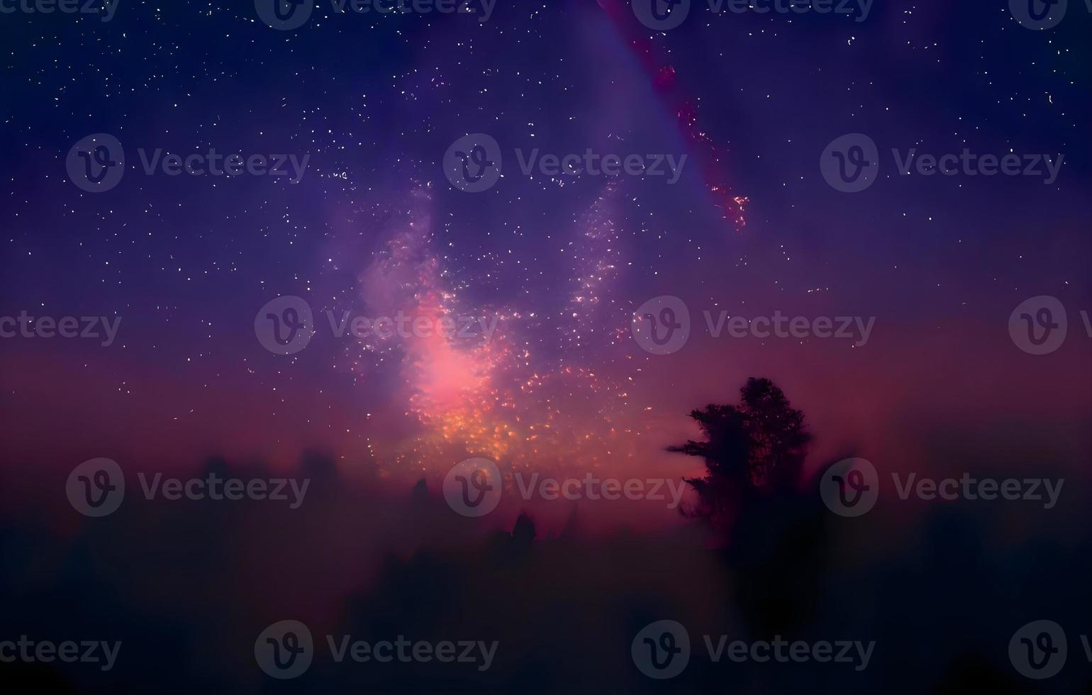 Milky Way and pink light at mountains. Night colorful landscape. Starry sky with hills at summer. Beautiful Universe. Space background with galaxy. Travel background photo