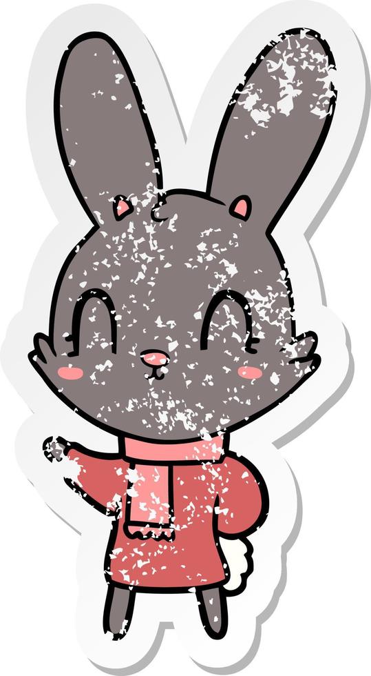 distressed sticker of a cute cartoon rabbit wearing clothes vector