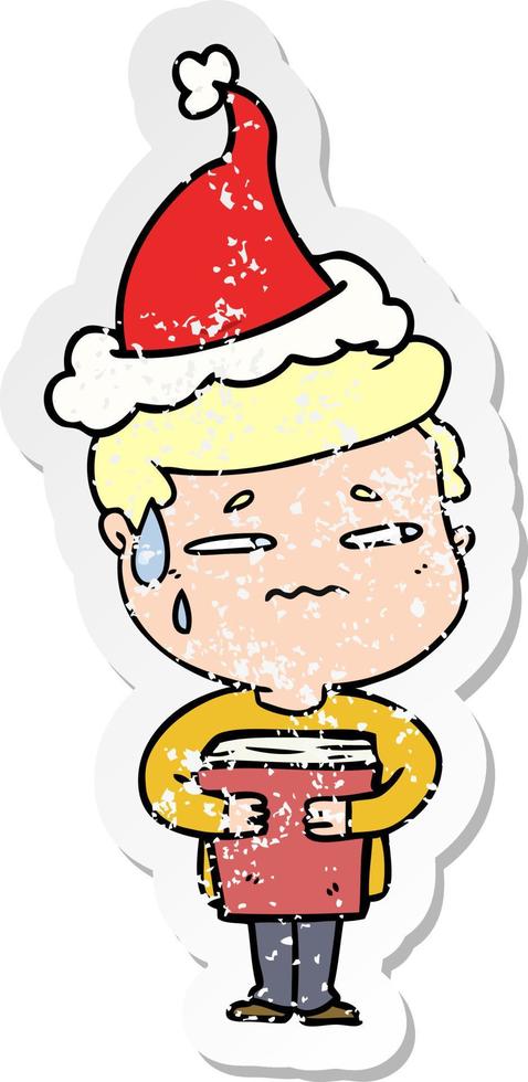 distressed sticker cartoon of a anxious boy carrying book wearing santa hat vector