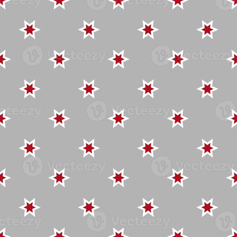 Seamless pattern of stars on a grey background photo
