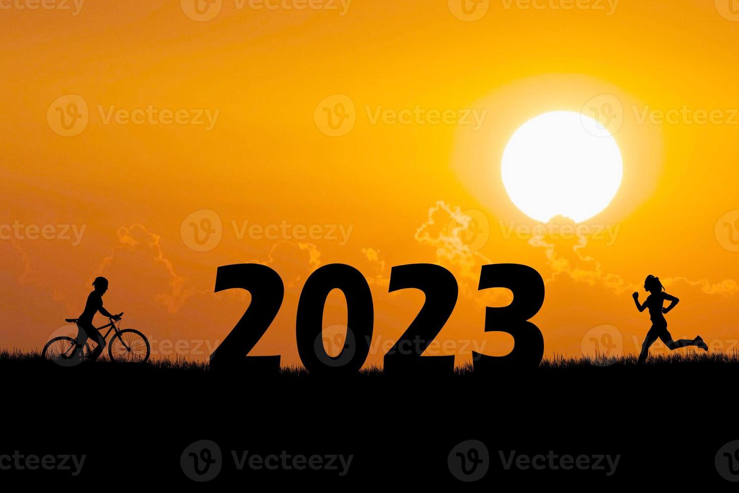 Bicycle adventurous tourists carrying bicycles over obstacles. happy new year 2023 photo