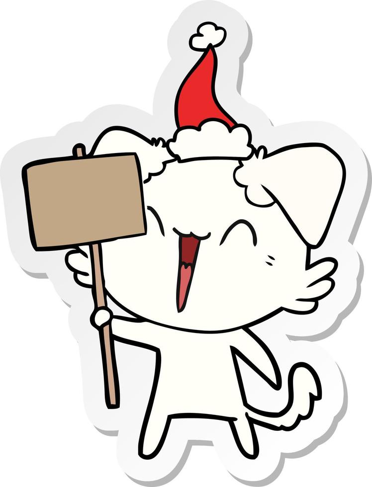 happy little sticker cartoon of a dog holding sign wearing santa hat vector