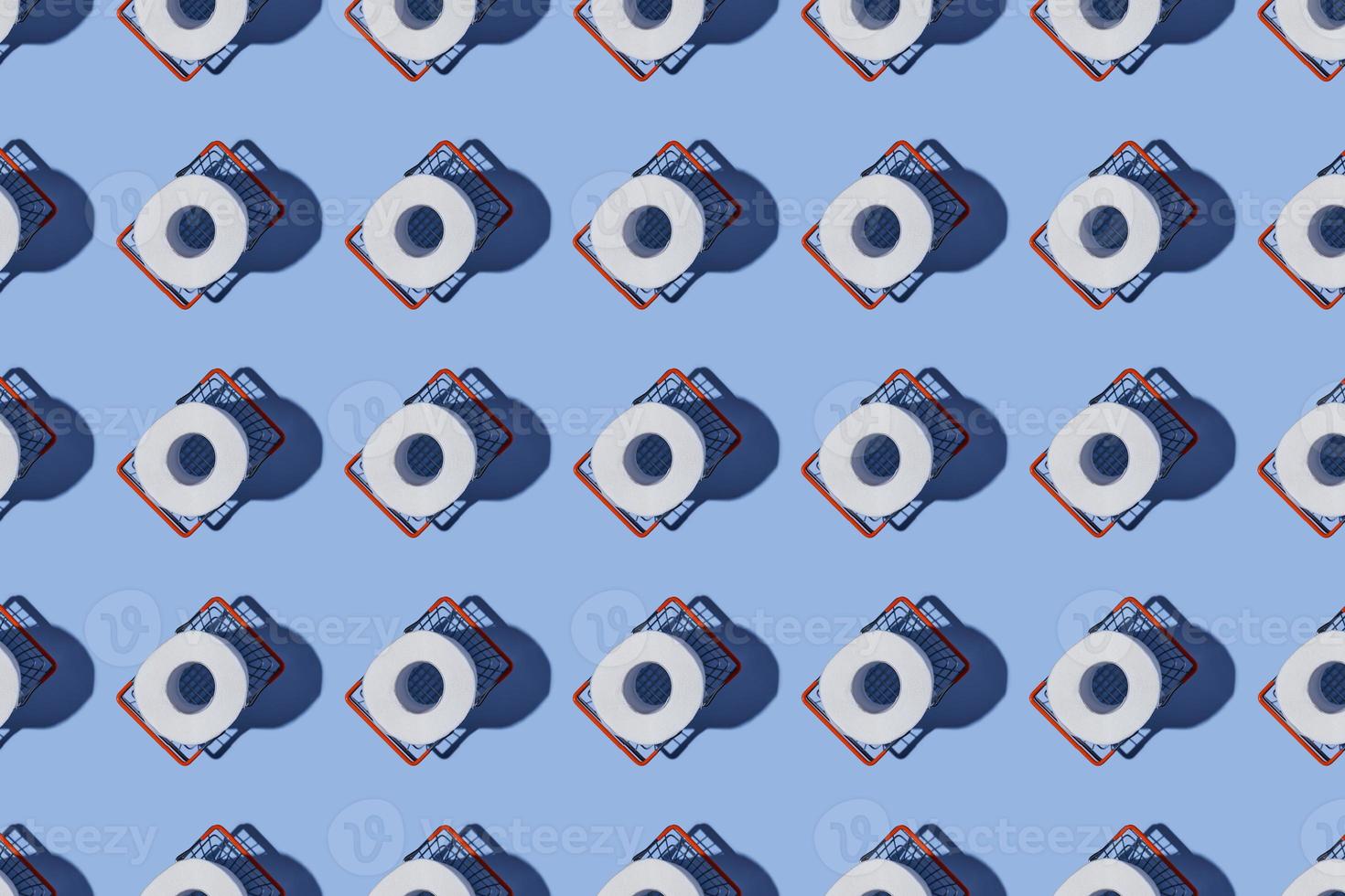 Seamless Pattern made of Toilet paper rolls. New Corona virus infection background. The concept of hygiene. photo
