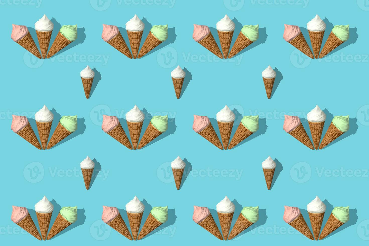 Seamless pattern of cones of multi-colored ice cream 3d rendering. Pink, white and green ice cream with shadow are isolated on blue background. photo