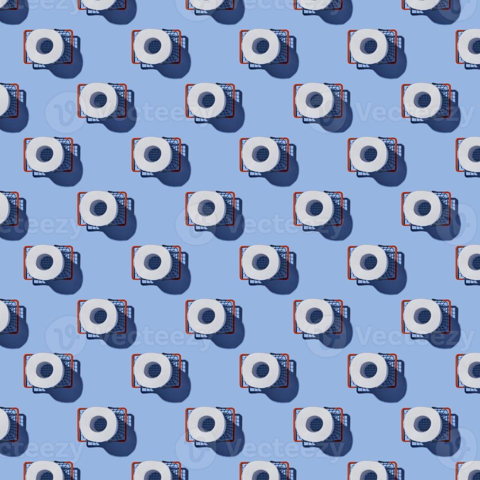 Seamless Pattern made of Toilet paper rolls. New Corona virus infection background. Pandemic panic concept. photo