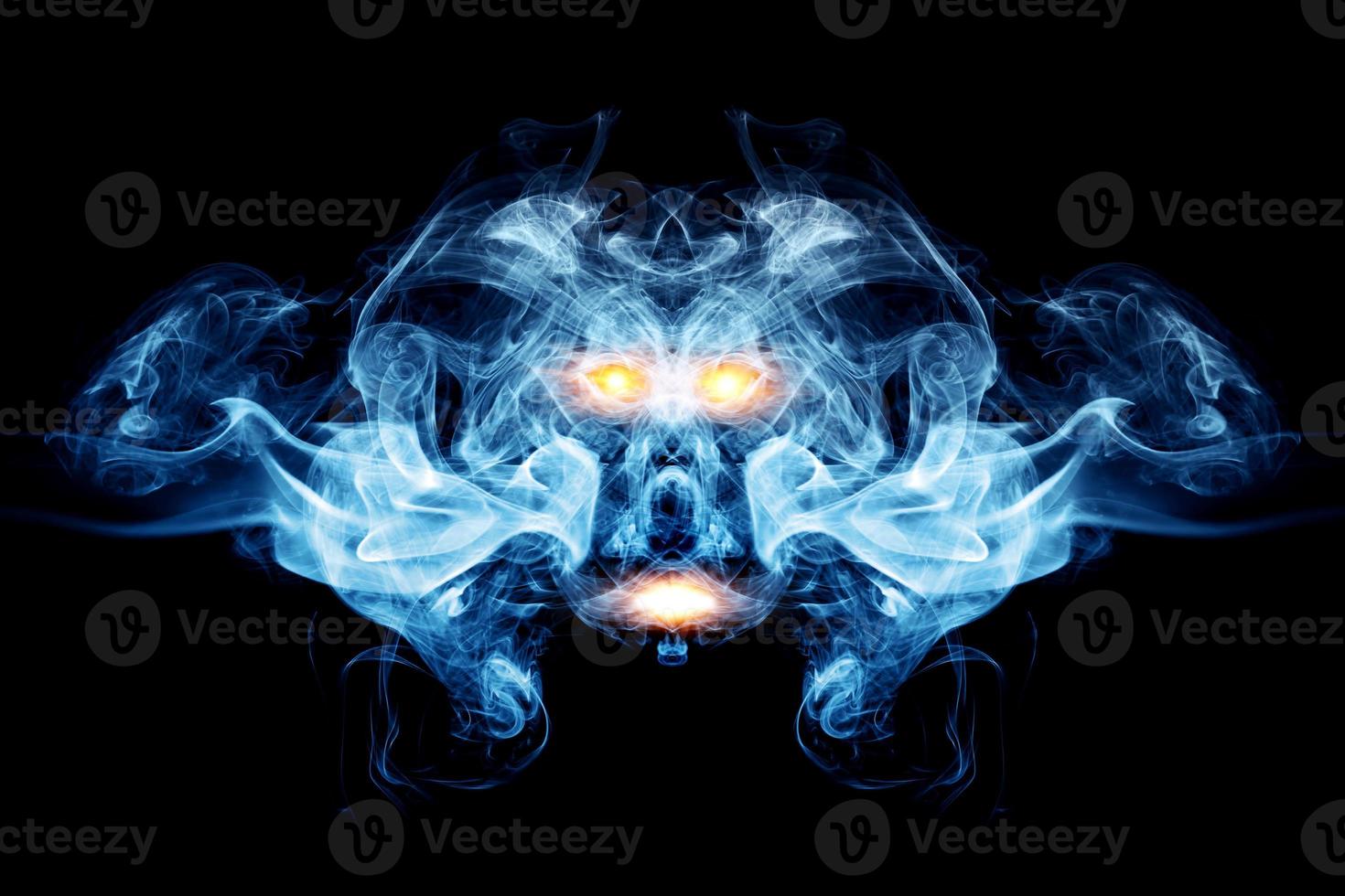 Abstract face made of smoke, flames. Ghost, devil, logo element, background photo