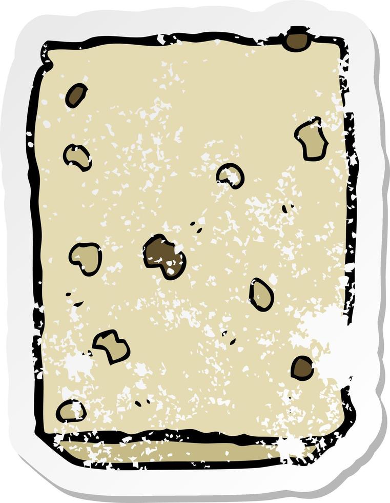 distressed sticker of a cartoon biscuit vector
