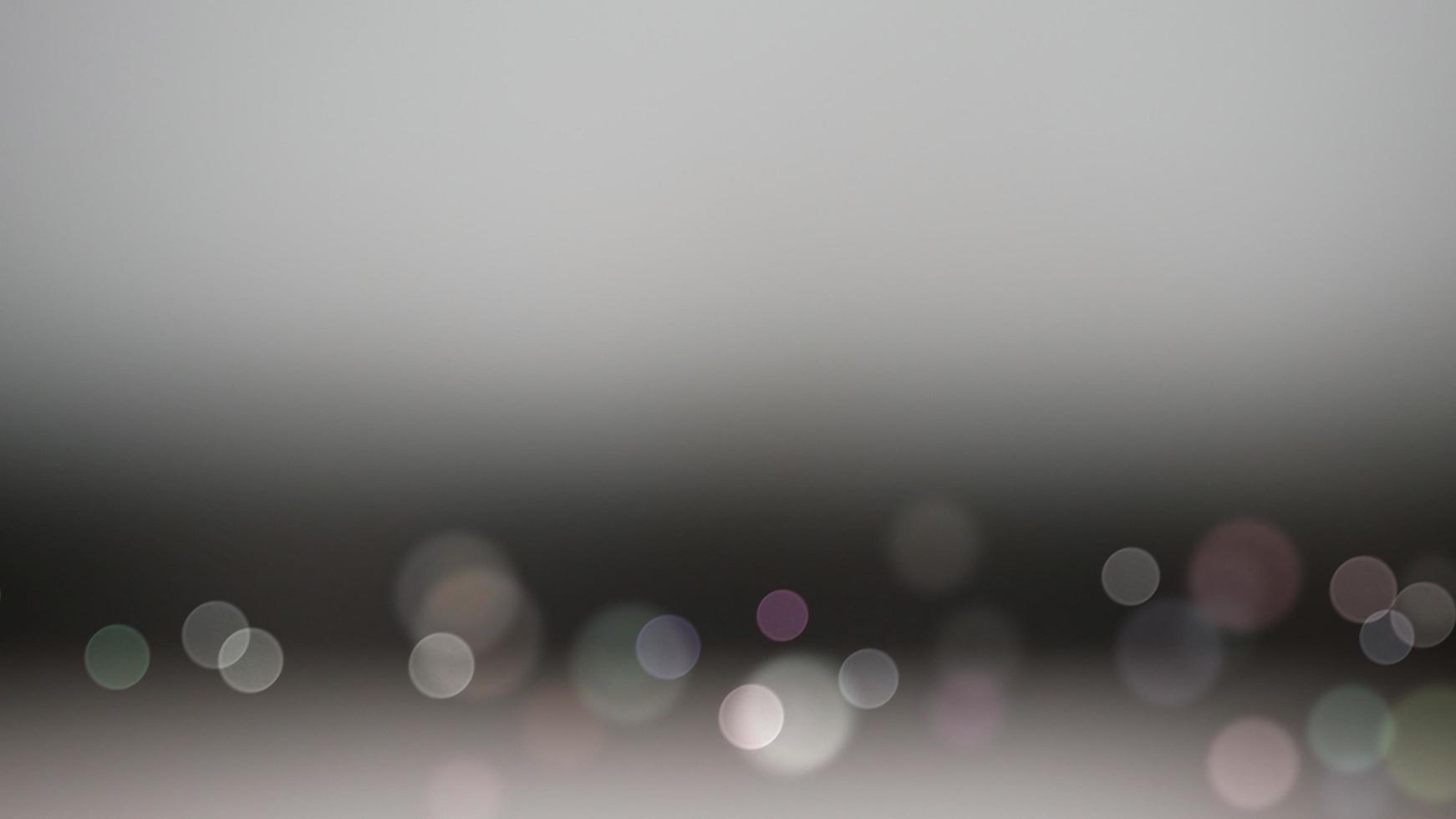 The illuminated white bokeh image can be used as a background illustration or add text. photo