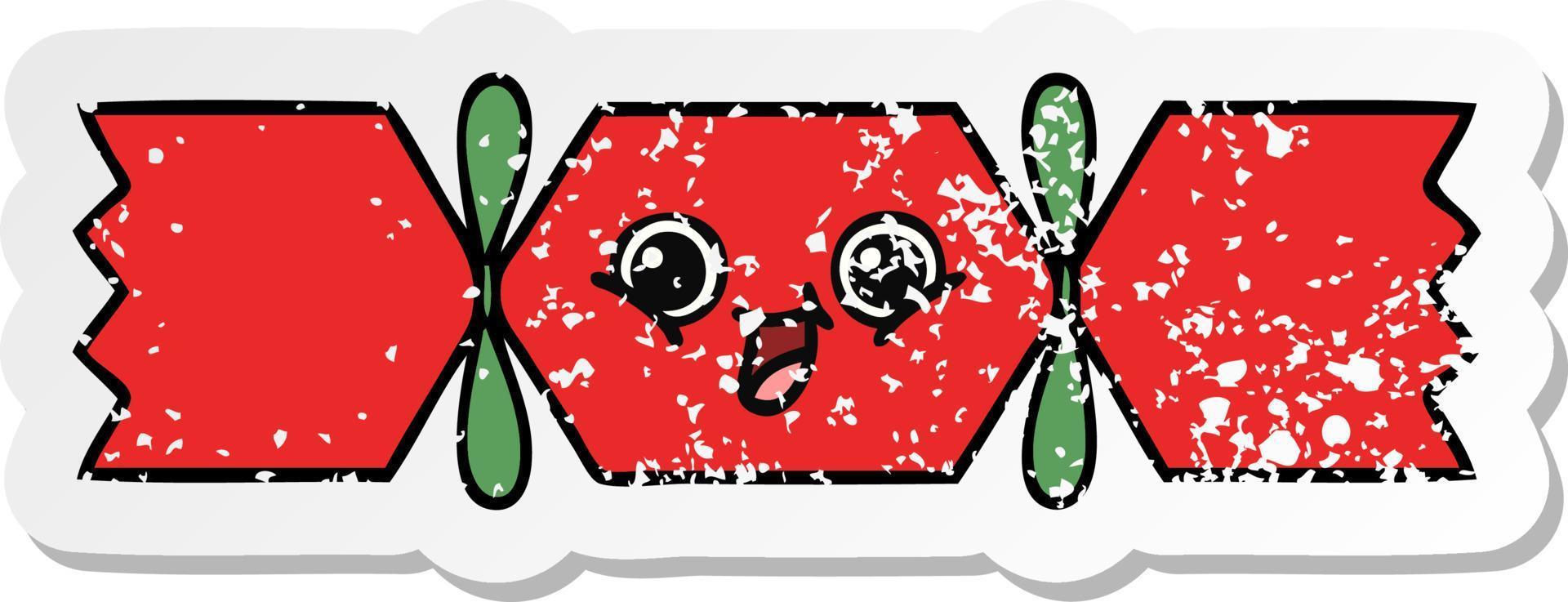 distressed sticker of a cute cartoon christmas cracker vector