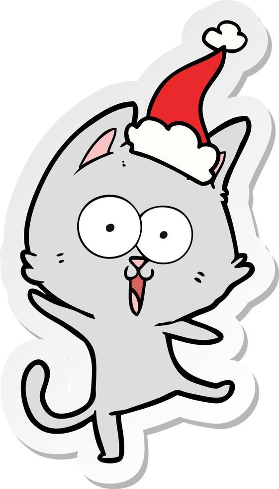 funny sticker cartoon of a cat wearing santa hat vector