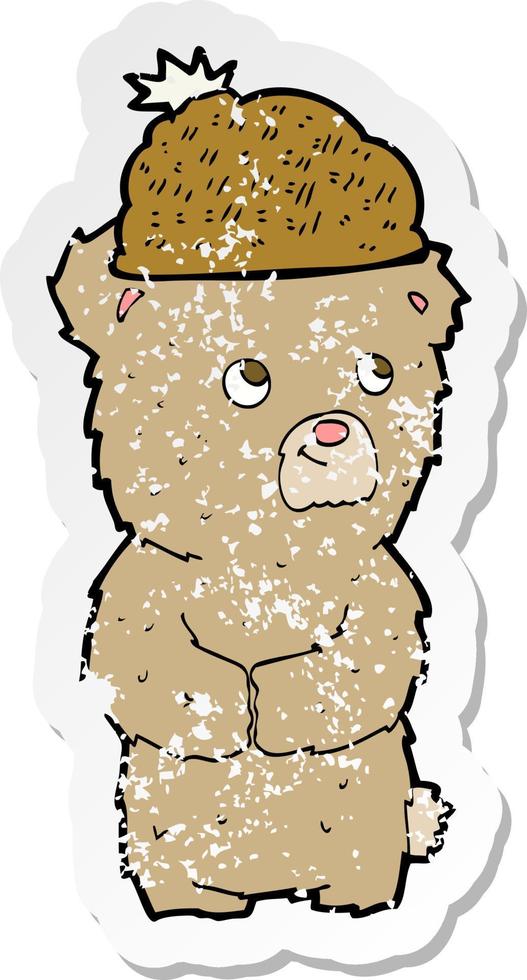 retro distressed sticker of a cartoon bear in hat vector