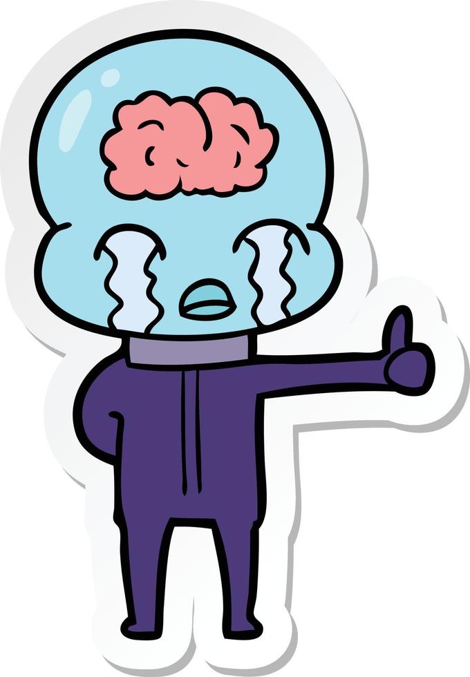 sticker of a cartoon big brain alien crying but giving thumbs up symbol vector