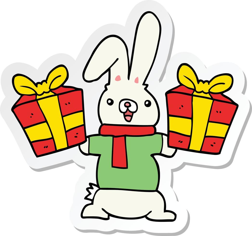 sticker of a cartoon rabbit with christmas presents vector