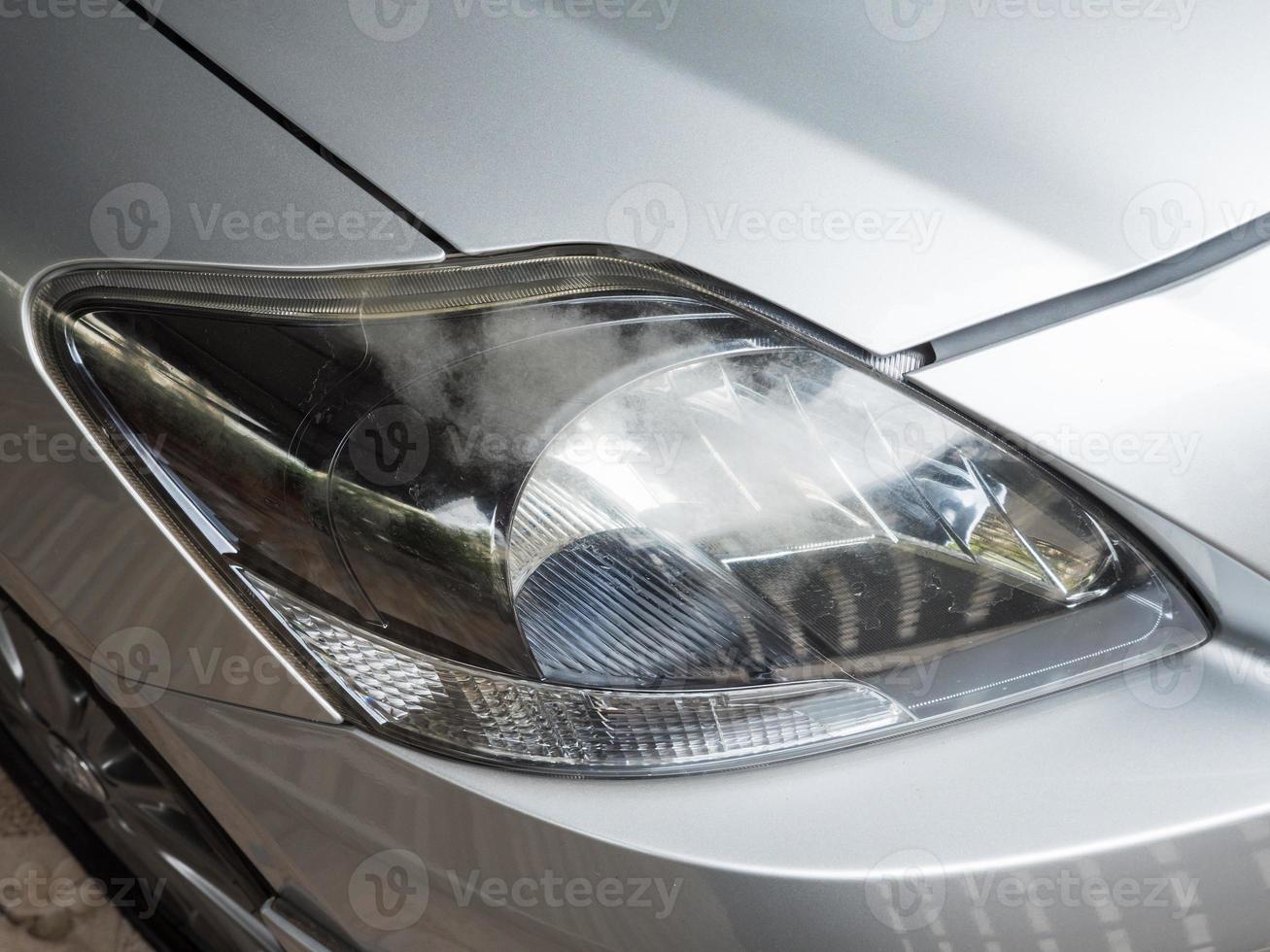 Varnish coating is peeling from the headlight. photo