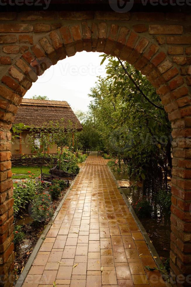 rural house made of clay and clay roof. The ideal country house for rest and relaxation in the bosom of nature photo