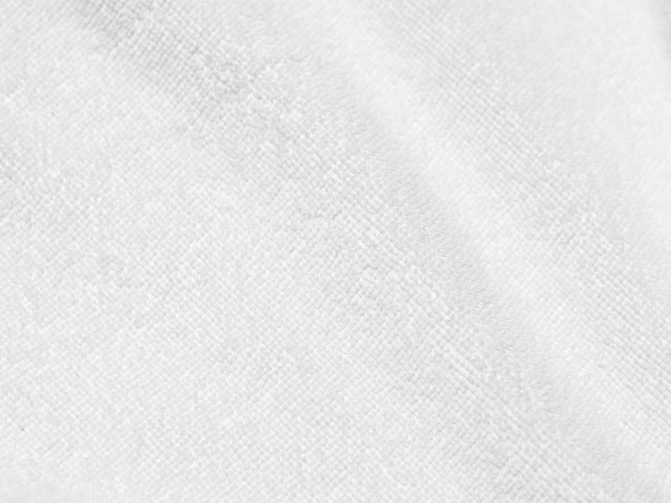 White clean wool texture background. light natural sheep wool. white seamless cotton. texture of fluffy fur for designers. close-up fragment white wool carpet.. photo