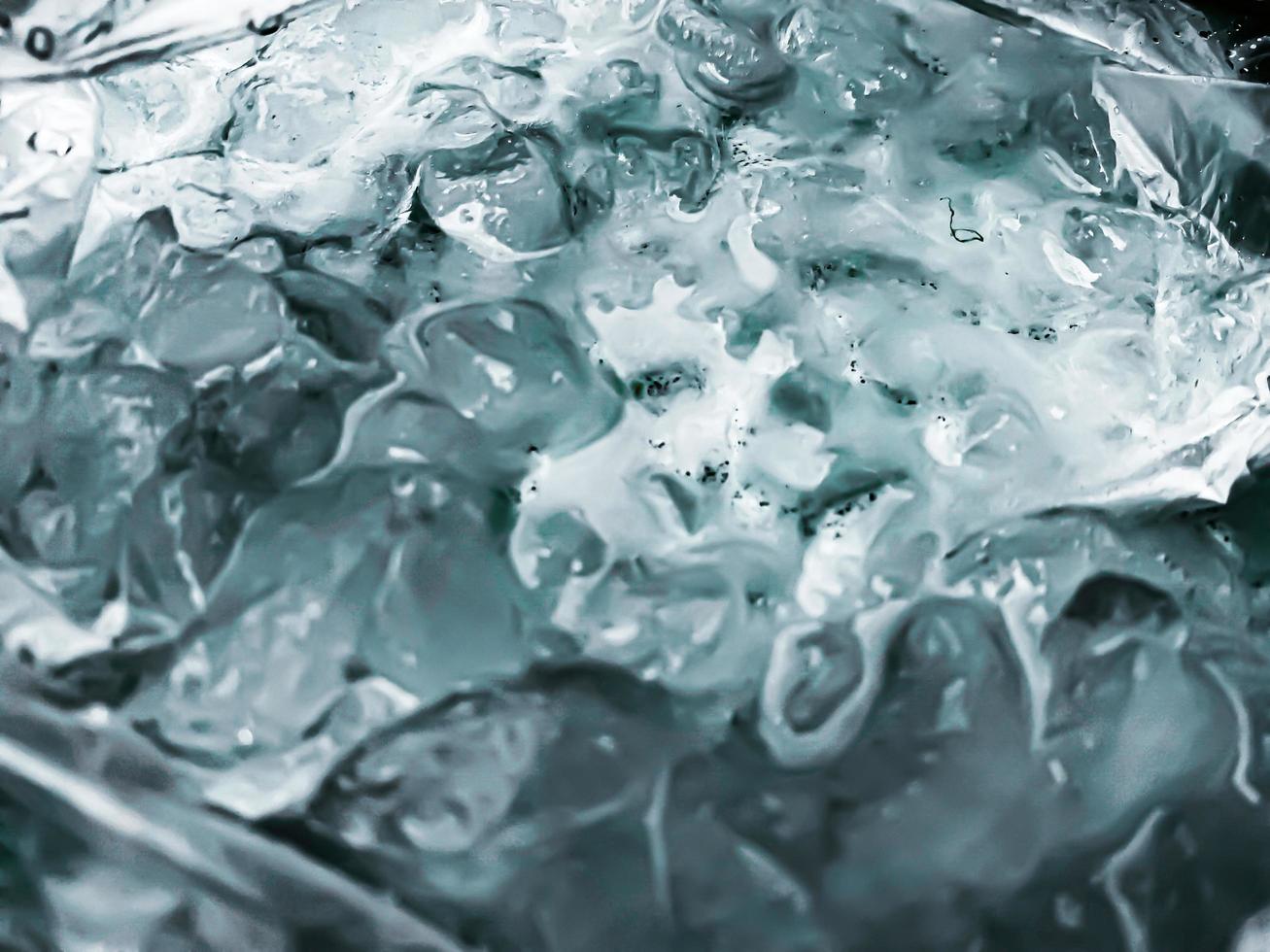 Abstract Ice background, Ice cubes feel fresh on hot days, Ice is indispensable in summer. It will help refresh and make you feel good. photo