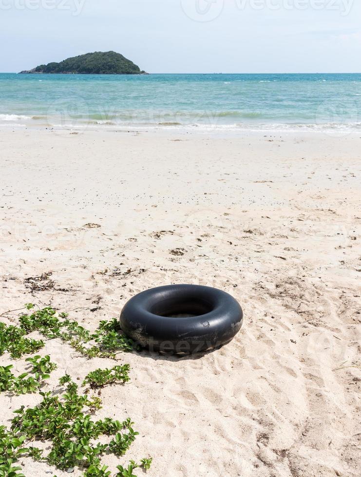 Large swim tube near the lonely beach. photo