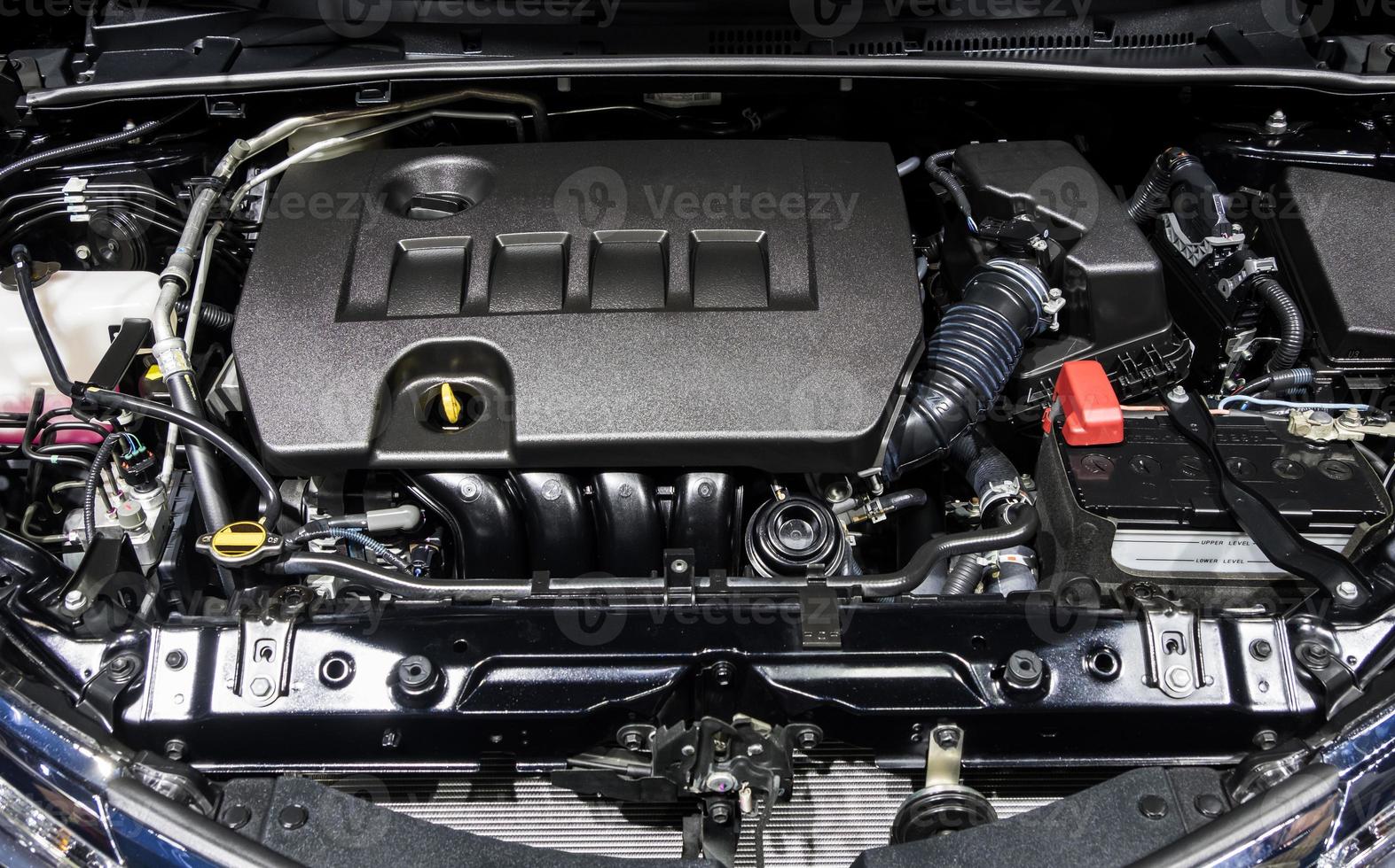 Closeup of the new gasoline engine for saving the fuel in the modern sedan car. photo