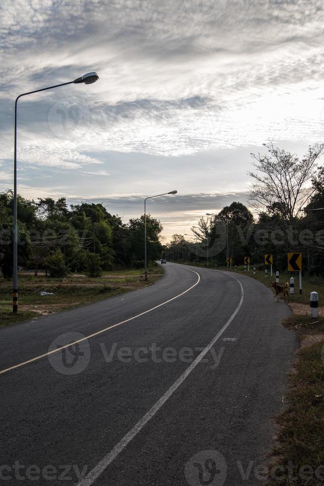 The silhouette of the local asphalt road. photo