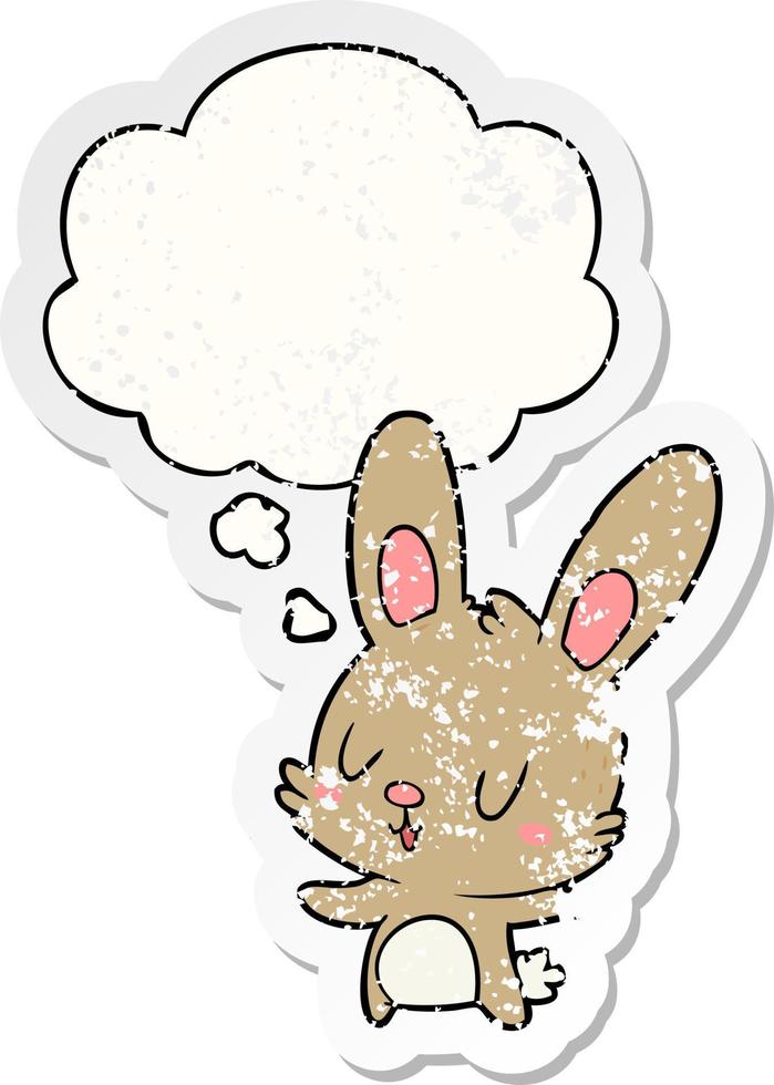 cute cartoon rabbit and thought bubble as a distressed worn sticker vector