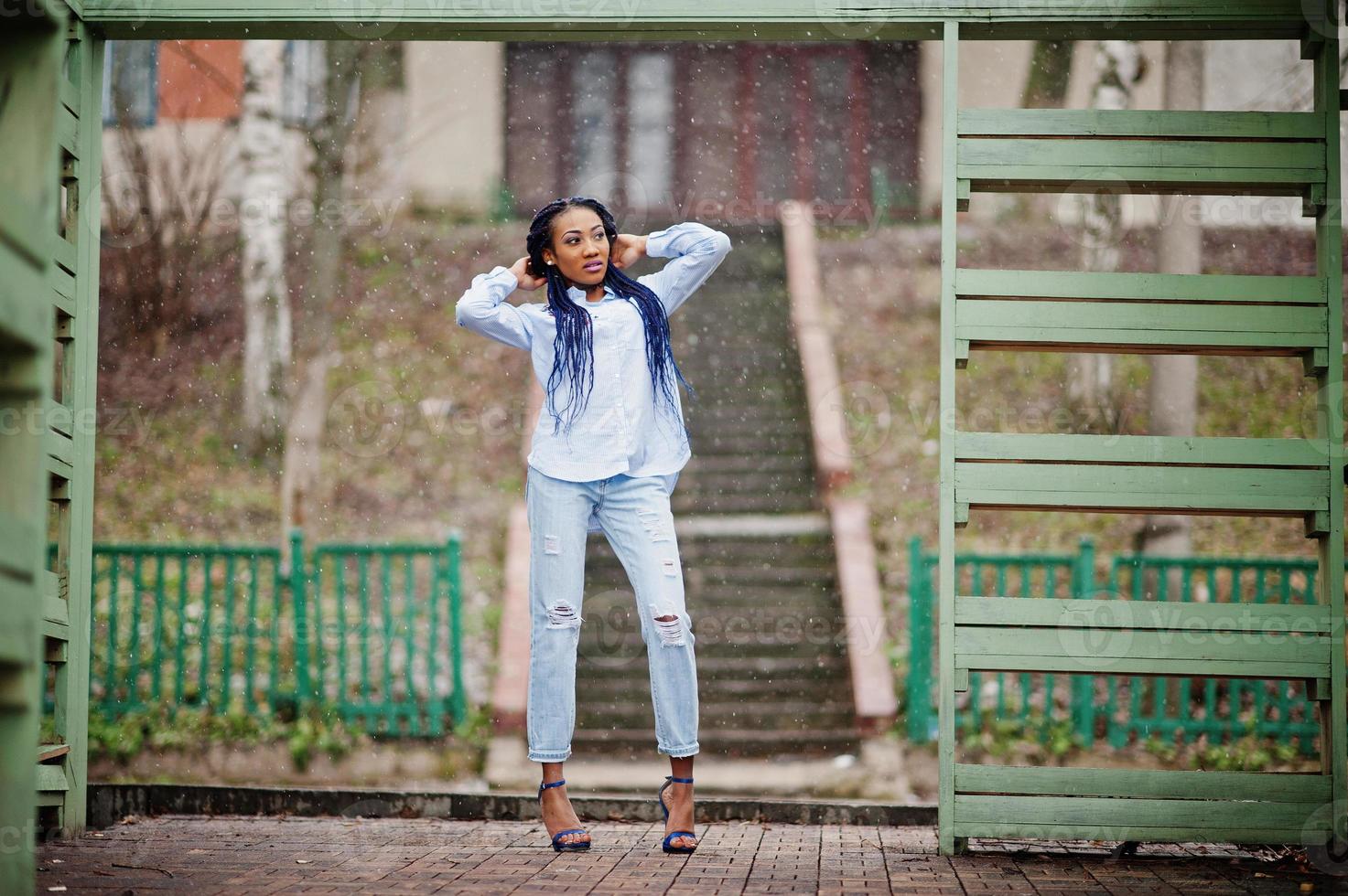 Stylish african american girl with dreads outdoor. photo