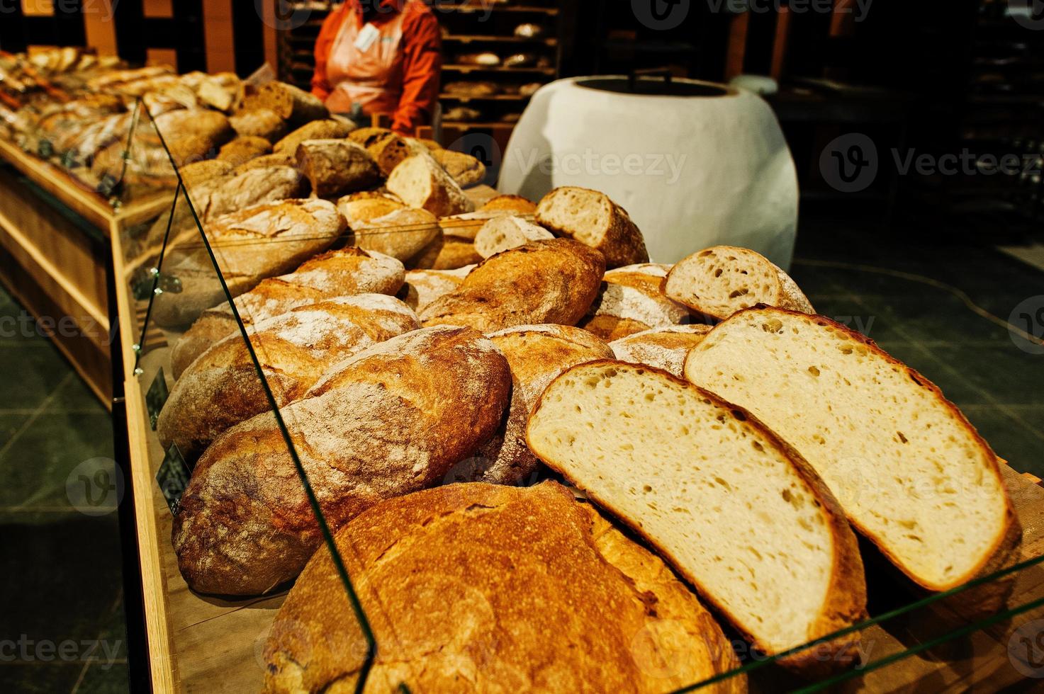 Various bread on supermarket shelves for sale. photo