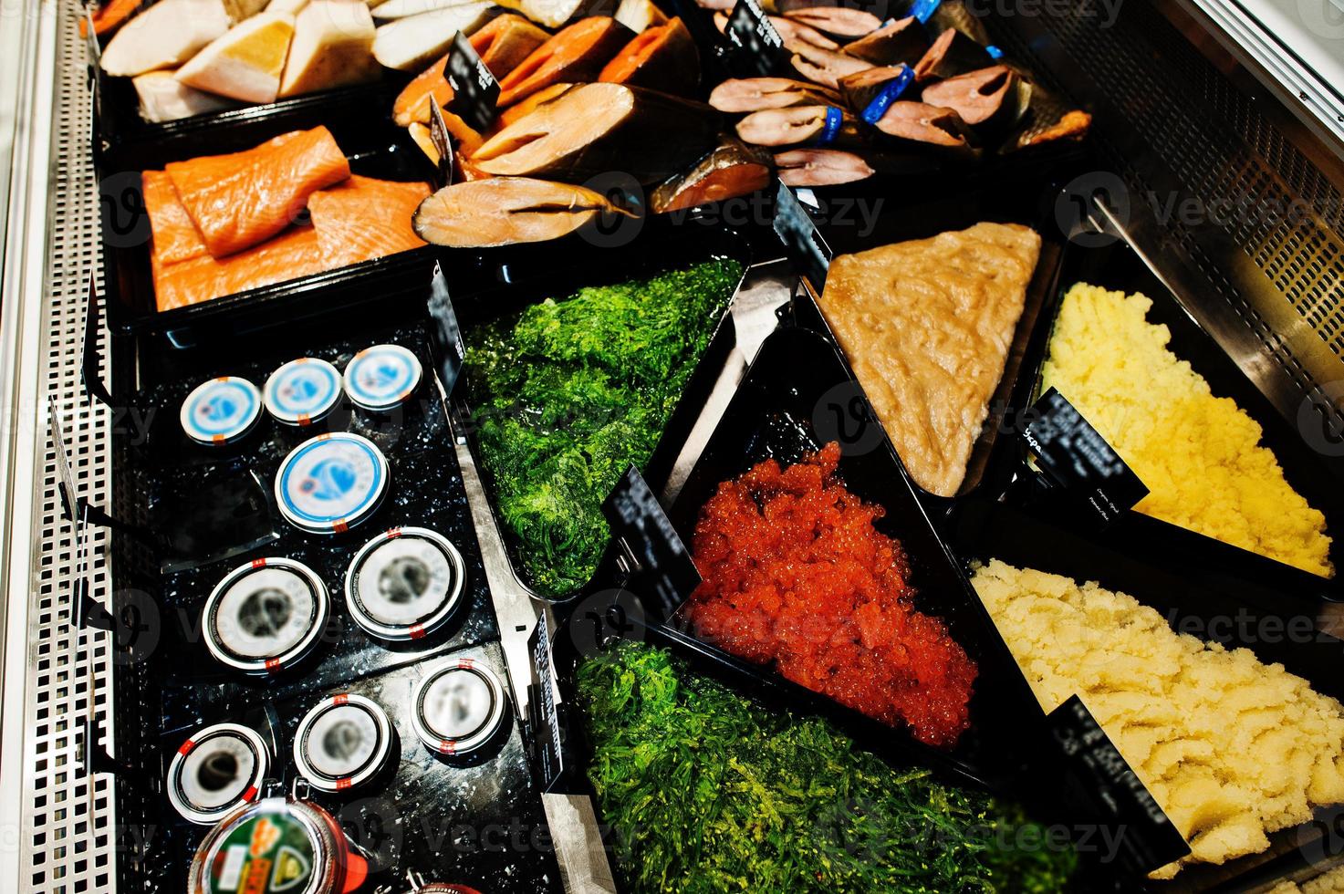 Various caviar for sale at supermarket. photo