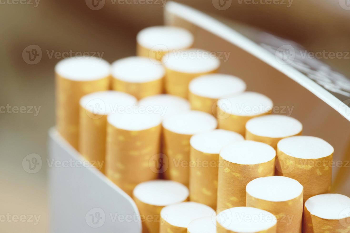 peel it off Cigarette pack prepare smoking a cigarette. Packing line up.  photo filters Natural light. soft focus