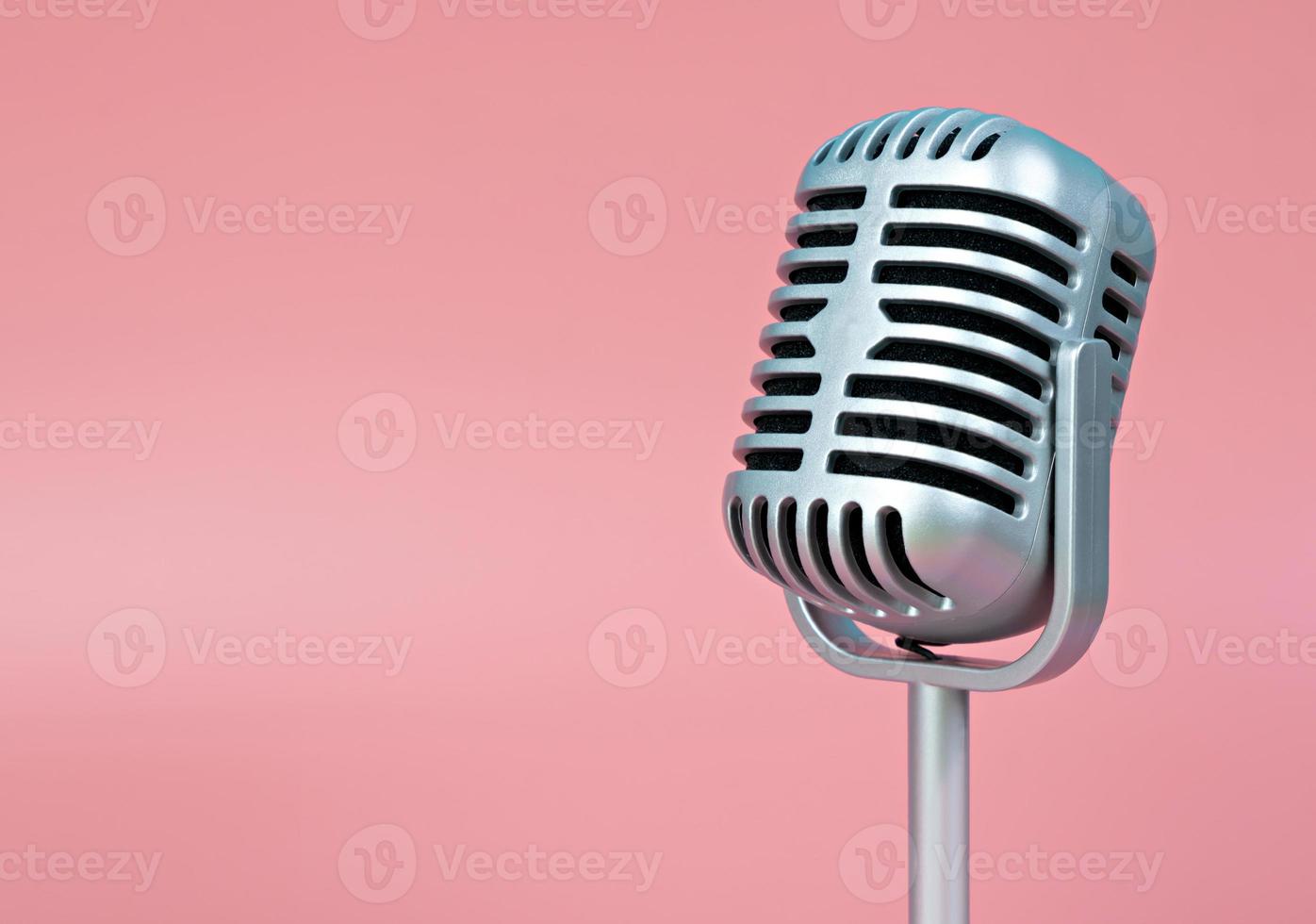 Microphone retro with copy space on pink background photo