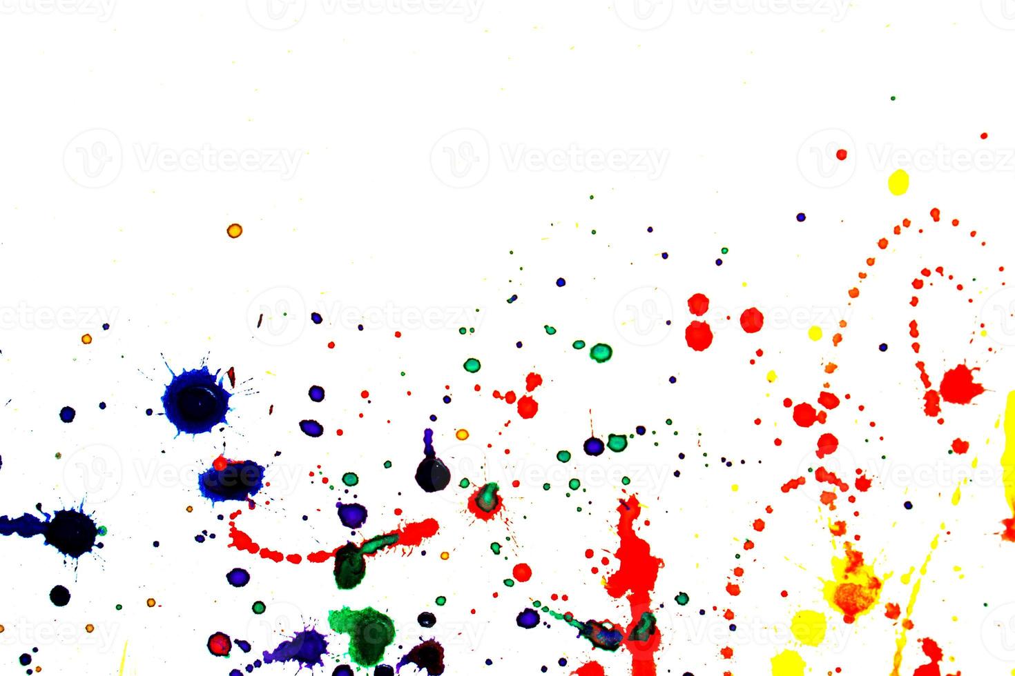 Abstract colorful watercolor splatters on white photo