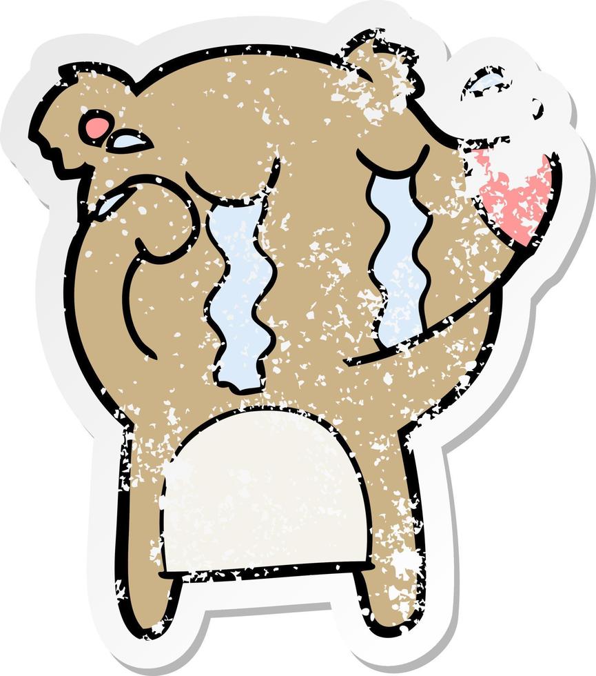 distressed sticker of a cartoon crying bear vector