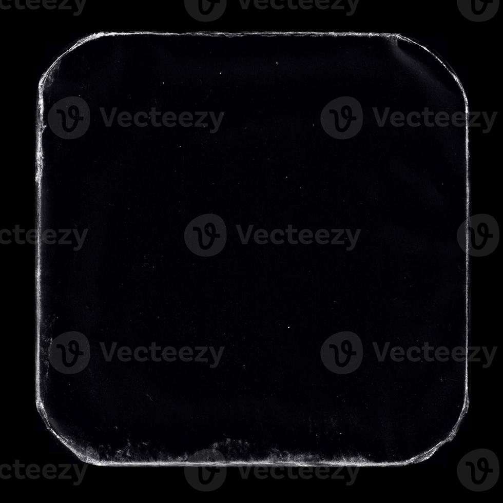 old paper texture in square frame for cover art. grungy frame in black background. can be used to replicate the aged look for your creative design. old paper edge elements for texture overlays photo