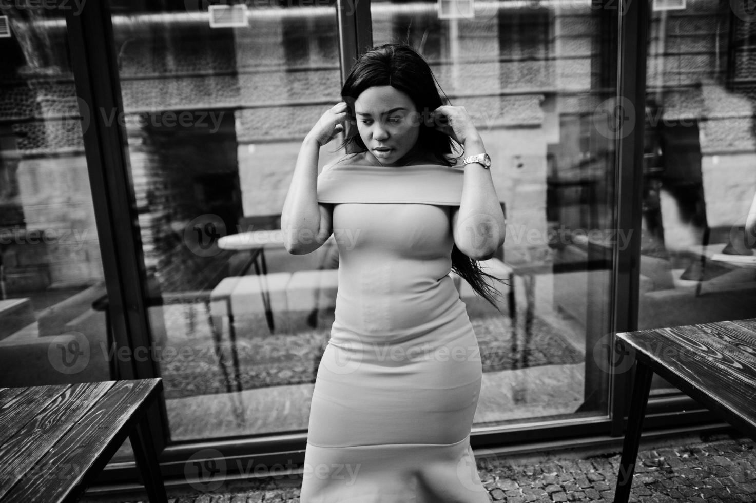 African american woman model xxl in orange dress. 10575800 Stock Photo