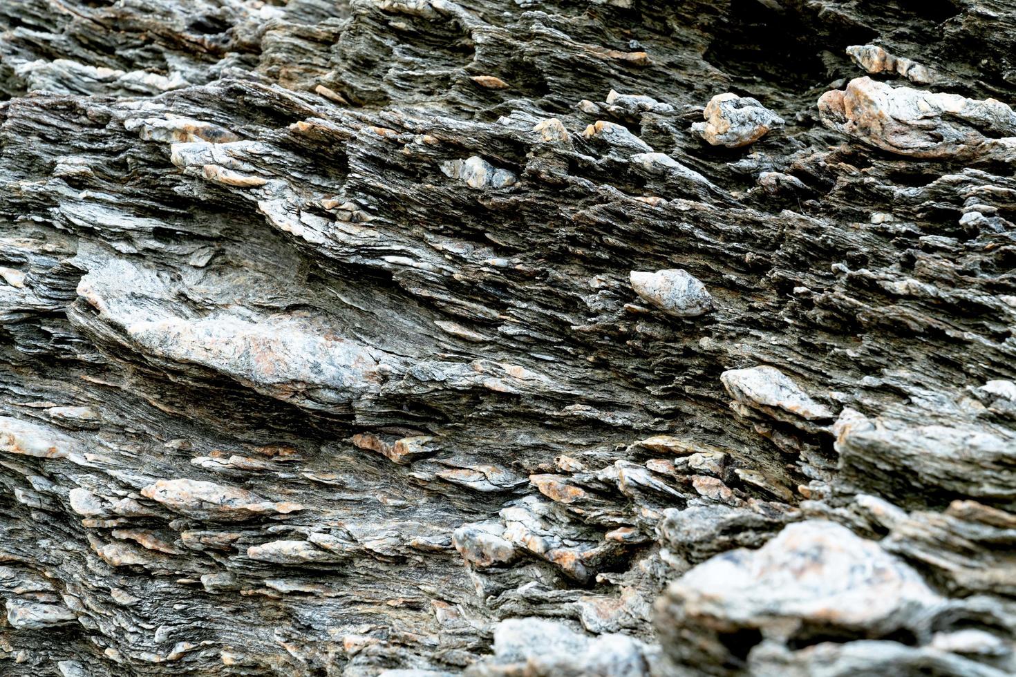 Primer plano de fondo de roca ígnea marrón foto