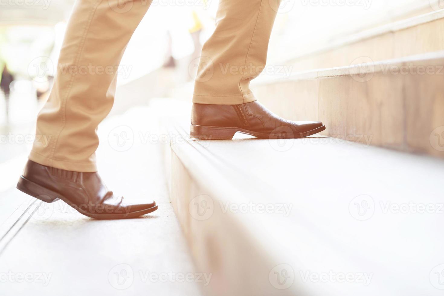 A man walking up the stairs photo