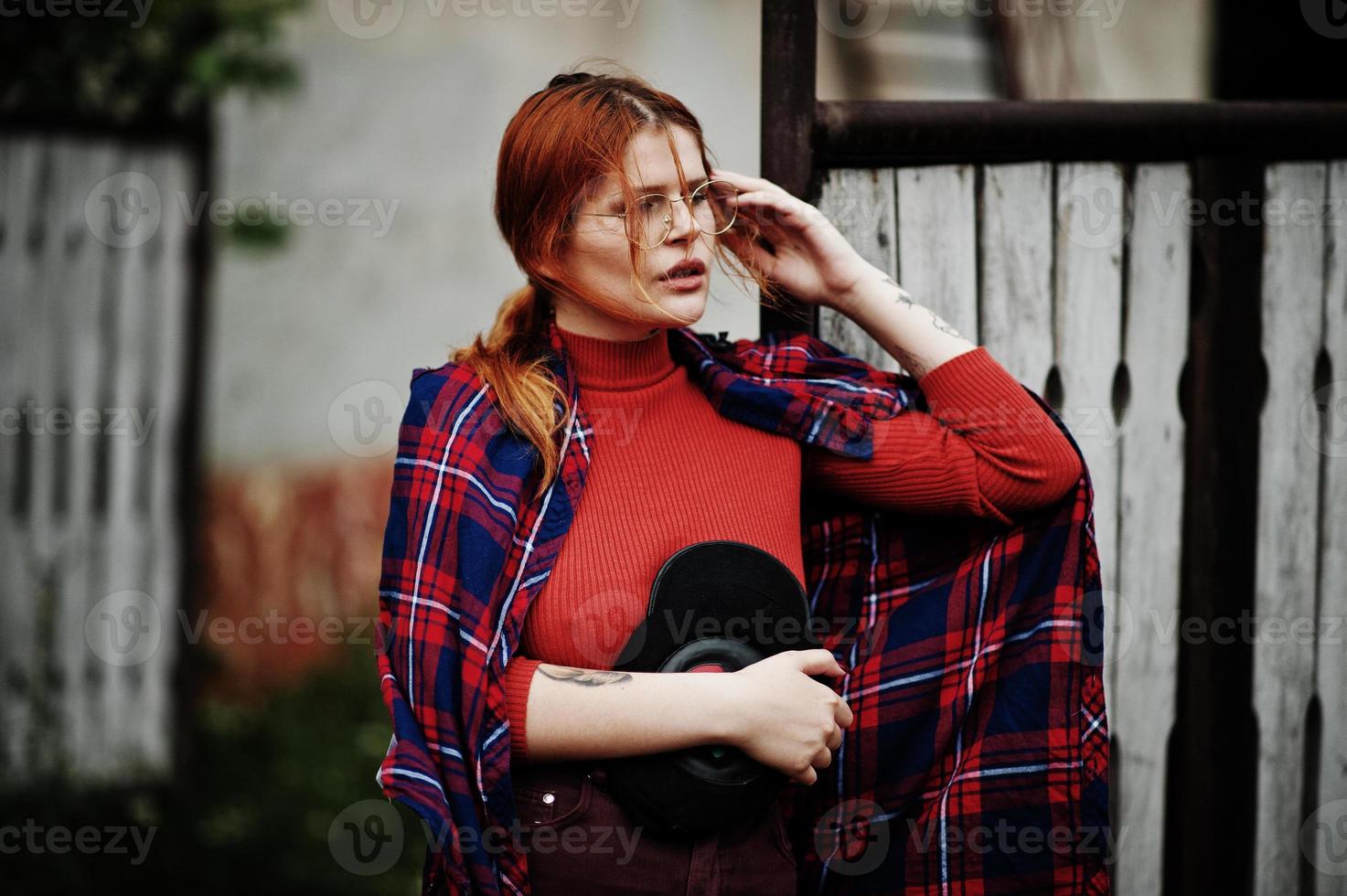 Fashion portrait of redhaired sexy girl outdoor. Model attractive seduction woman. photo