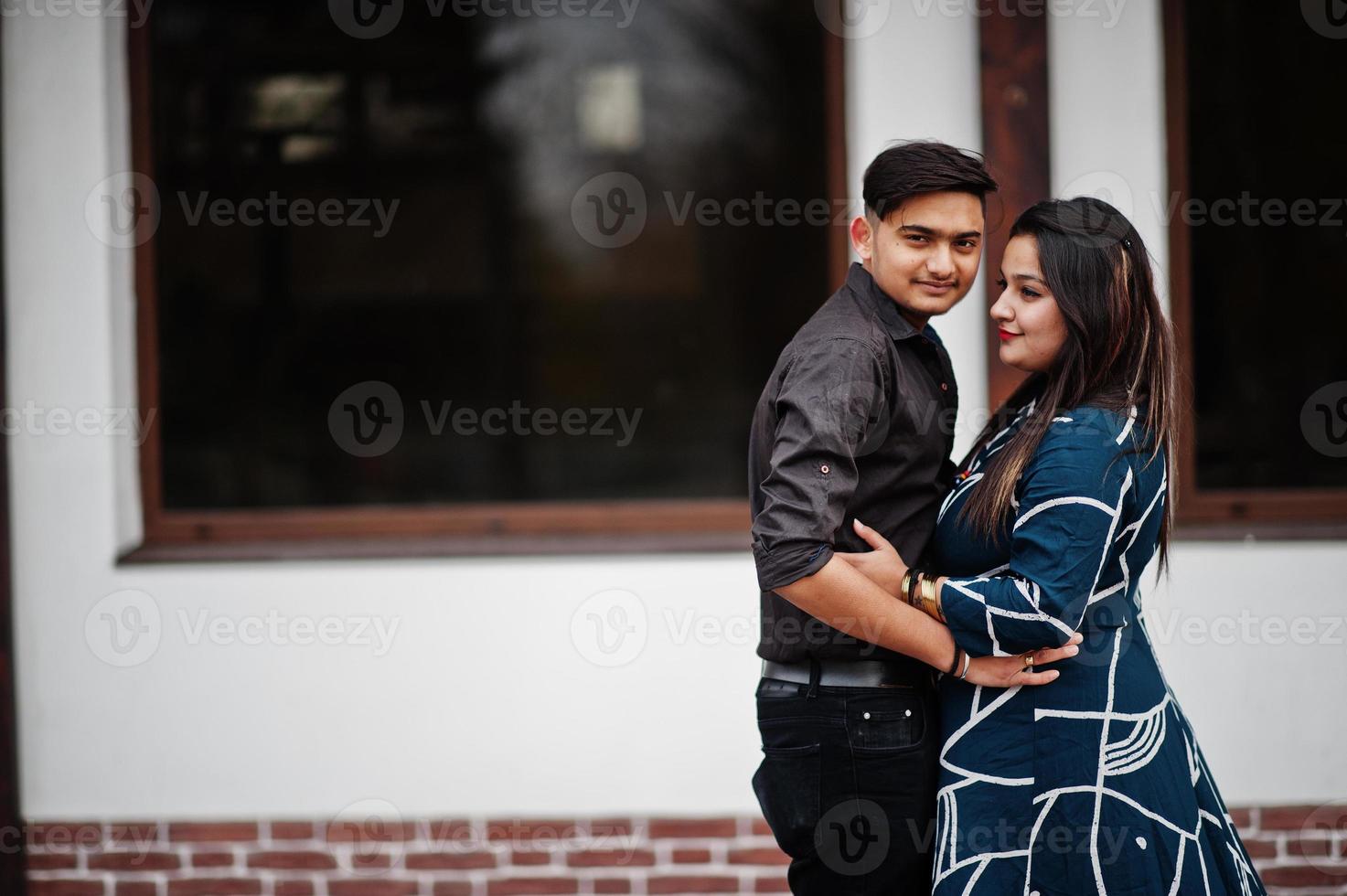 Love story of indian couple posed outdoor. photo