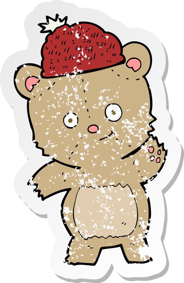 retro distressed sticker of a cartoon bear in hat vector