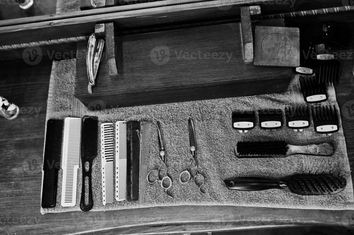 Barber tools on wooden background table. photo