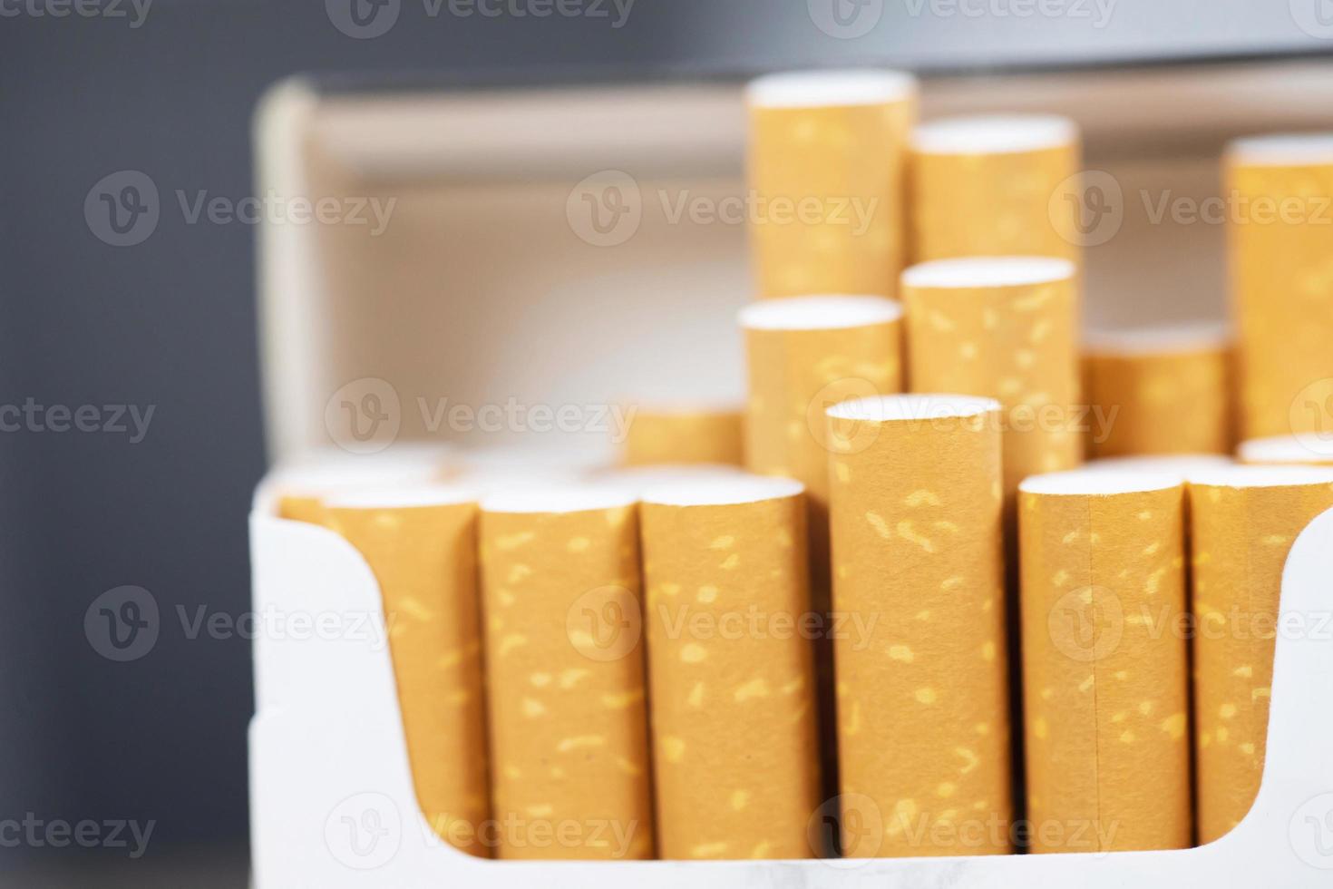 peel it off Cigarette pack prepare smoking a cigarette. Packing line up.  photo filters Natural light. soft focus