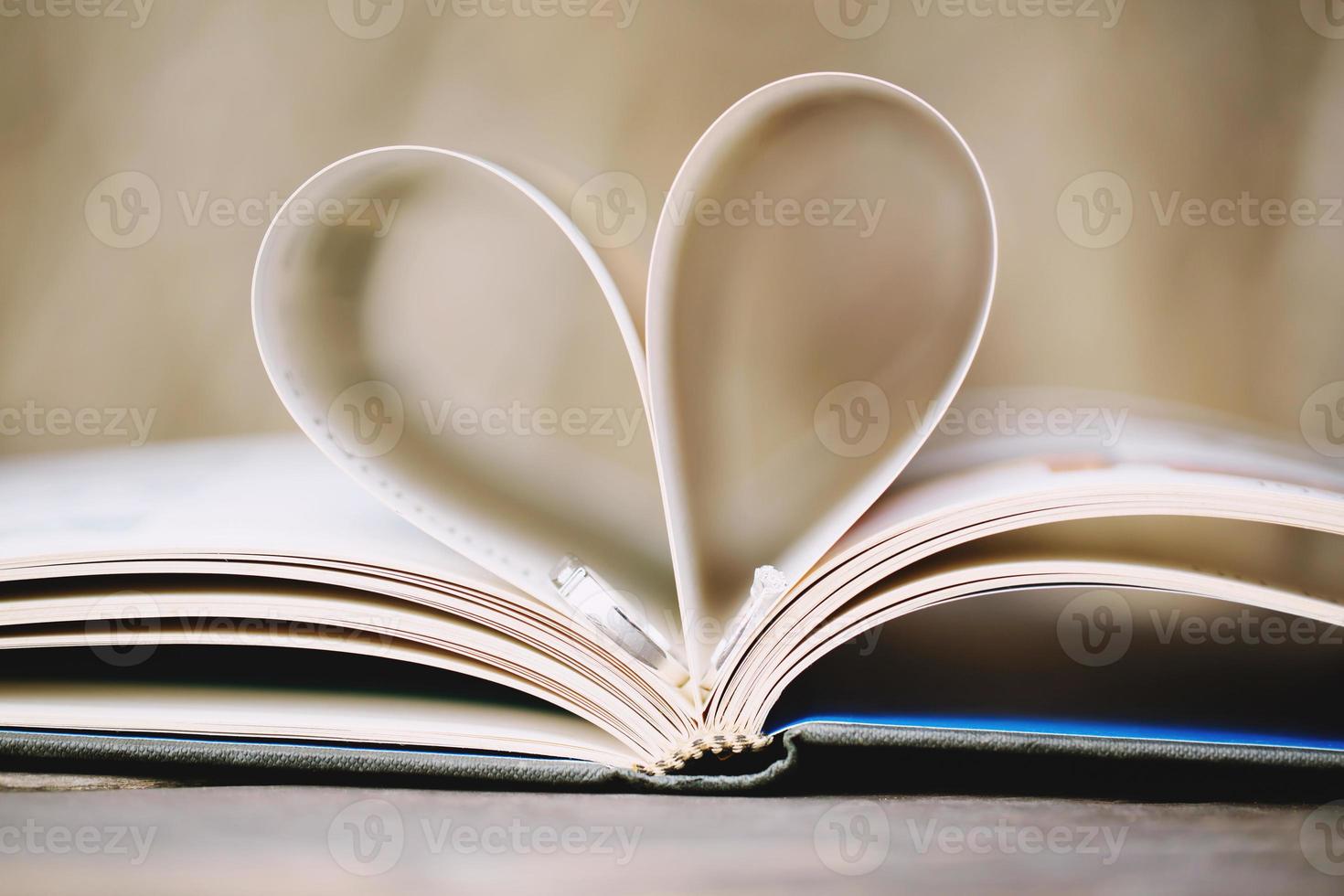 Wedding rings on open book photo