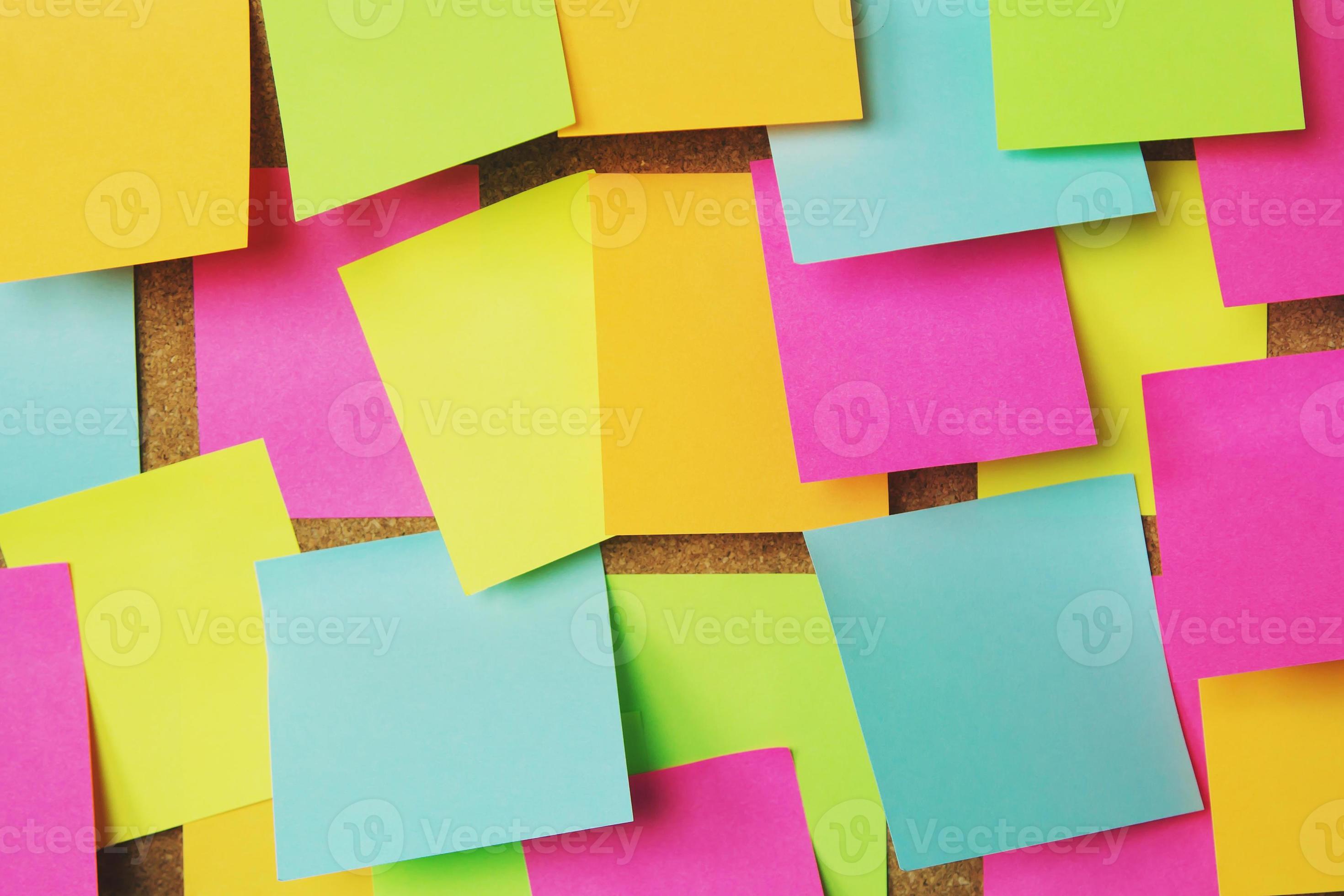 collection of colorful variety post it. paper note reminder sticky notes  pin on cork bulletin board. empty space for text. Stock Photo