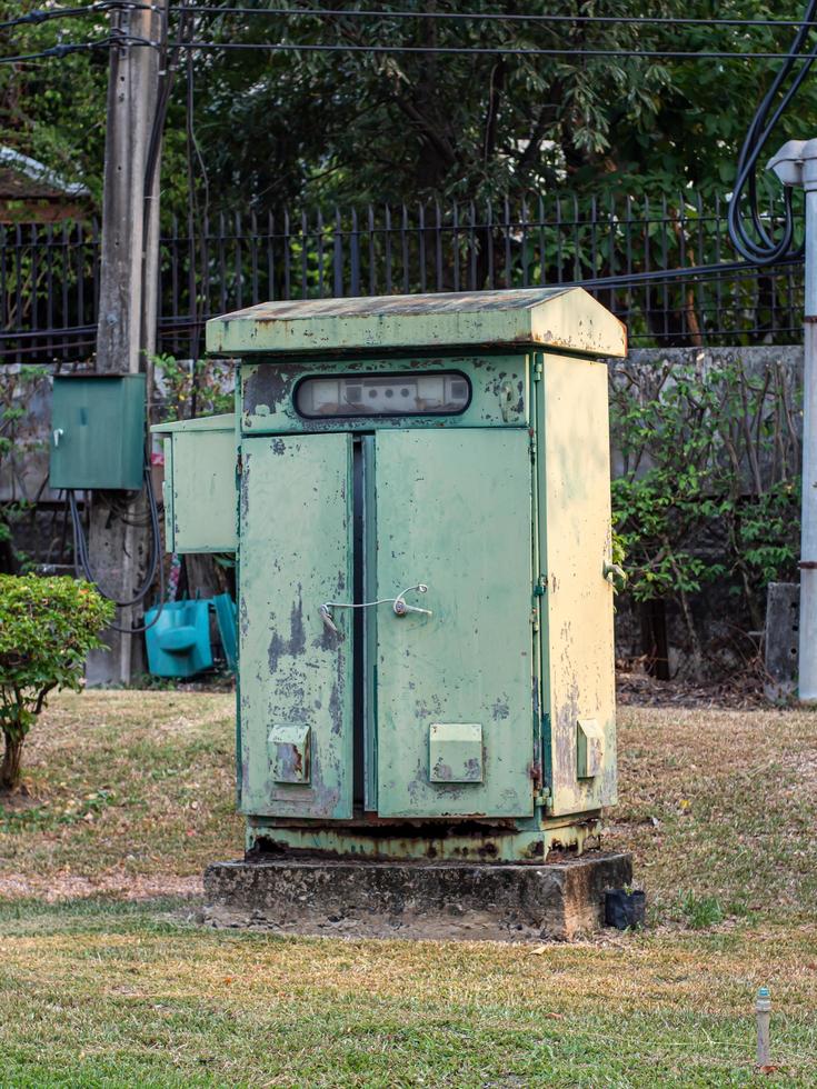 Heritage transformer substation in yard of residential building under construction. photo