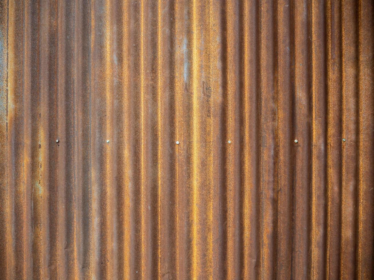 Old zinc wall texture background, rusty on galvanized metal panel sheeting. photo